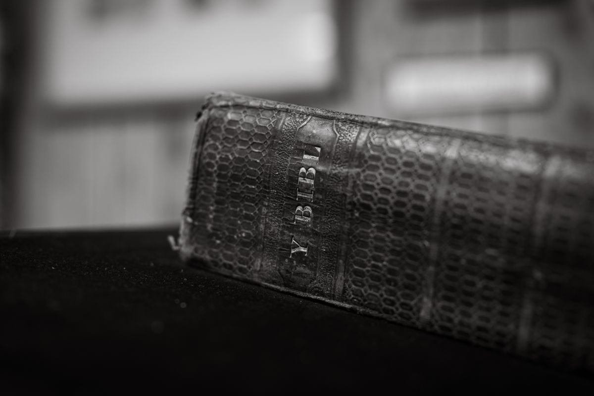 a dusty leather-bound medical ledger open on a desk