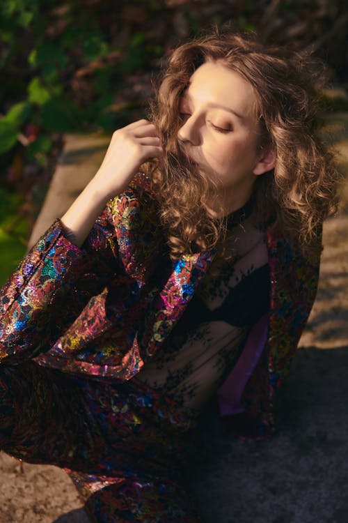 Woman with Brown Hair and Eyes Closed