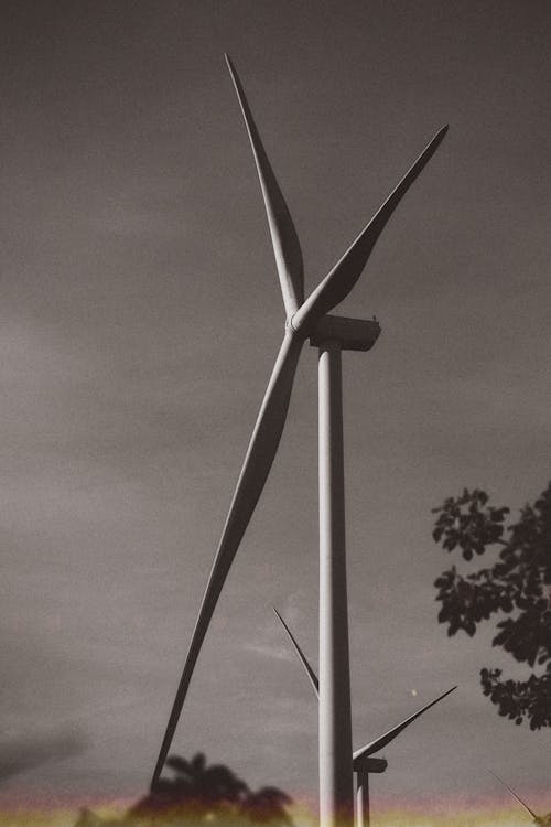 Monochrome Photo of a Windmill Turbine