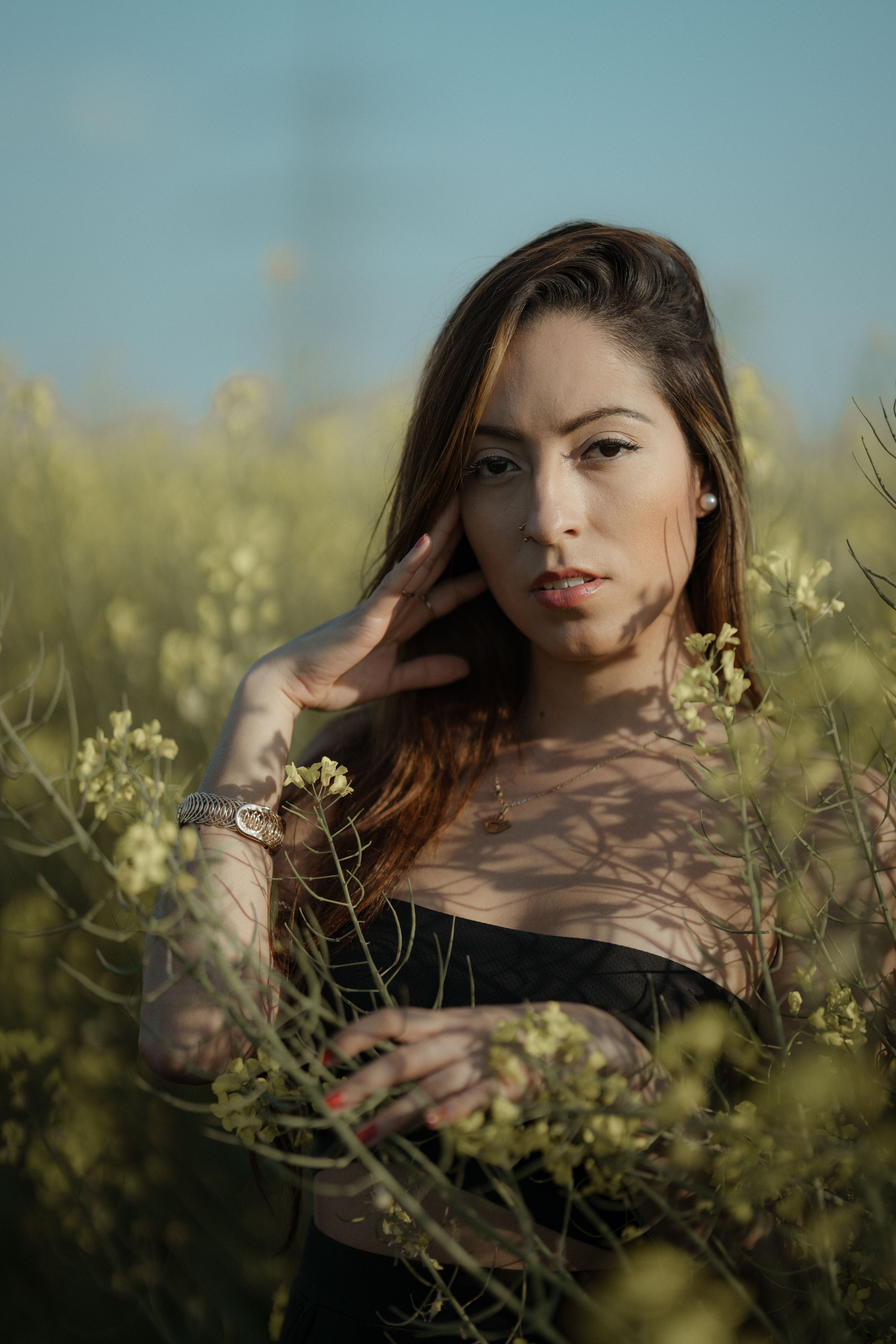 Model among Flowers on Meadow · Free Stock Photo