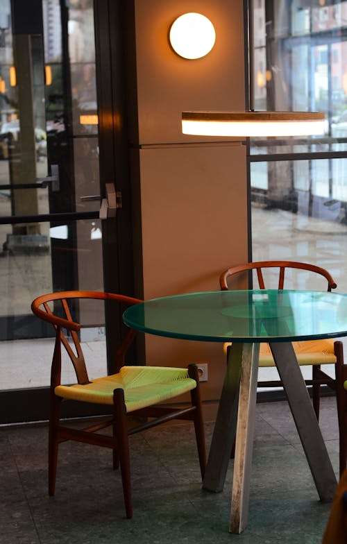 Chairs and Glass Table in Restaurant