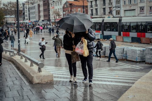 People on a Street During Rain