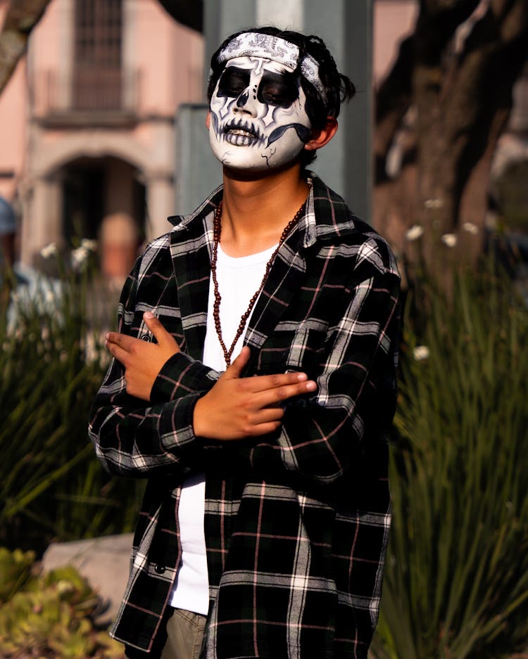 Portrait Of Man Wearing Mexican Painting On A Face 