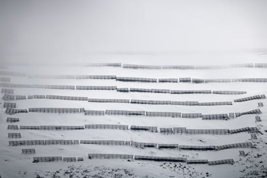 Captivating winter landscape of snow fences in Hintertux, Tirol, Austria.