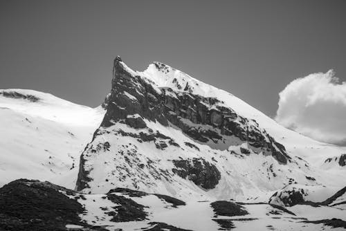 Black and white photo of a snowy mountain