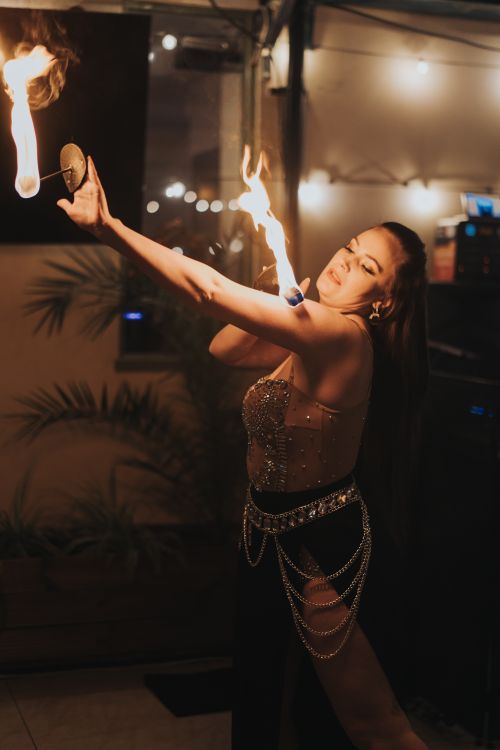 Woman Dancing with Fire · Free Stock Photo