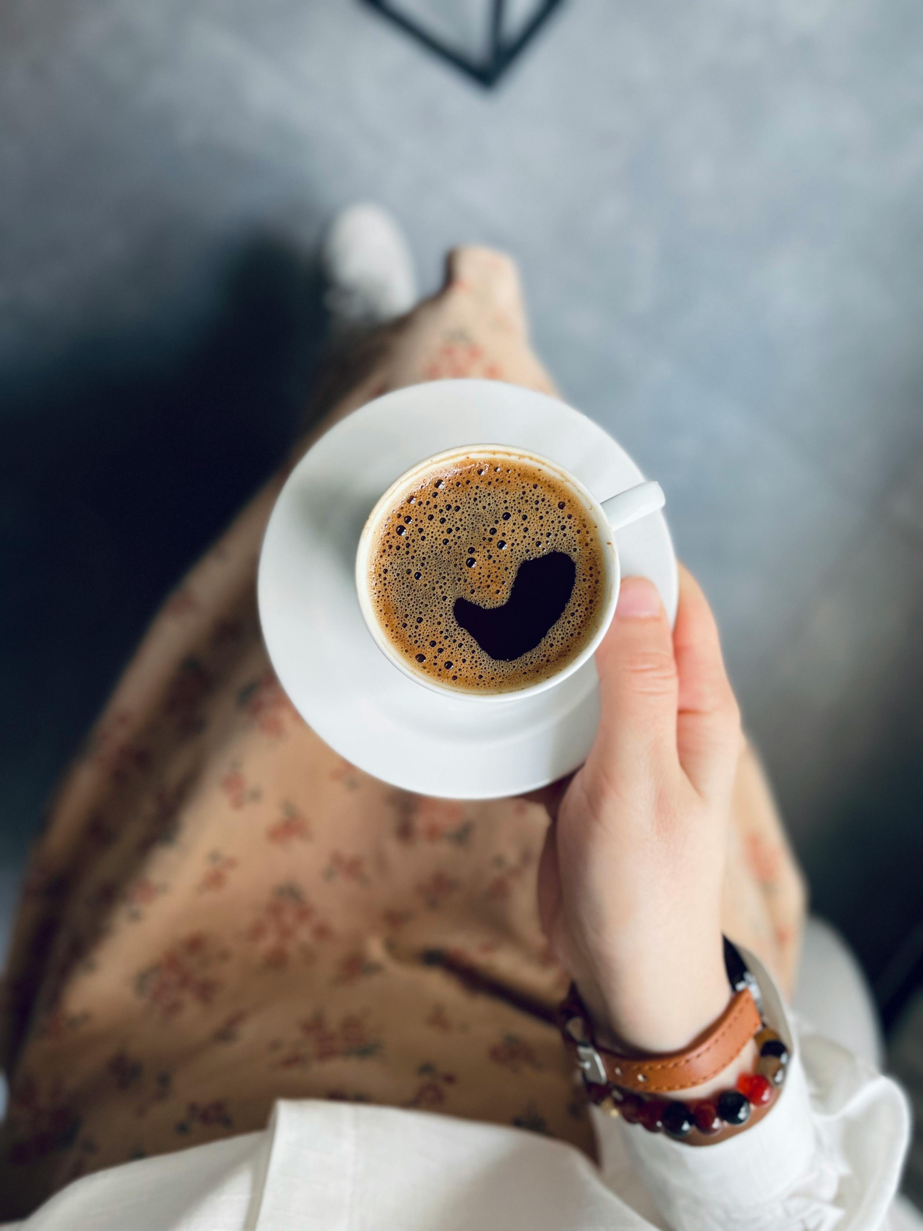 Woman drinking double espresso