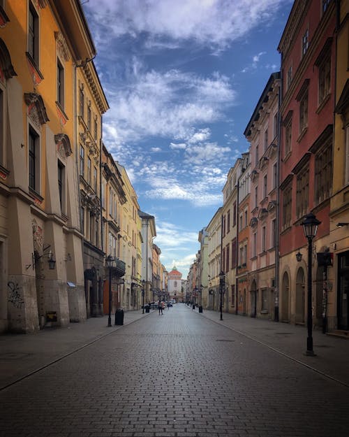 Cobblestone Alley with Medieval Tenements in Old Town