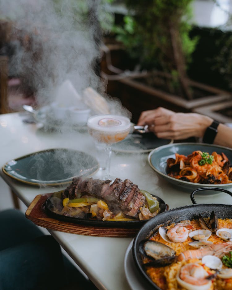 Meat Dishes Served On A Table 