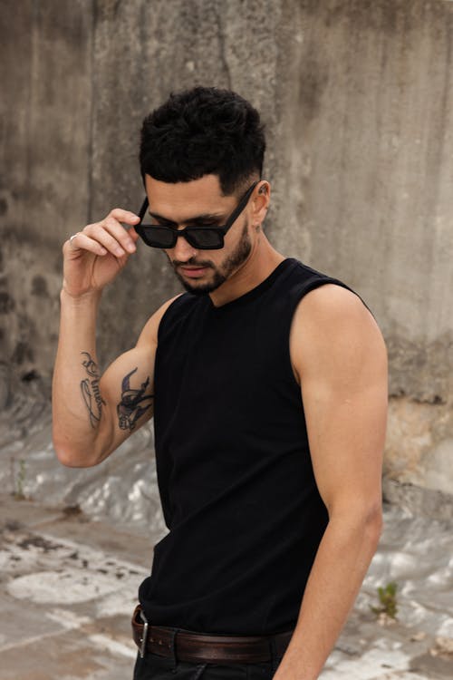 Man in Sunglasses and Black Tank Top