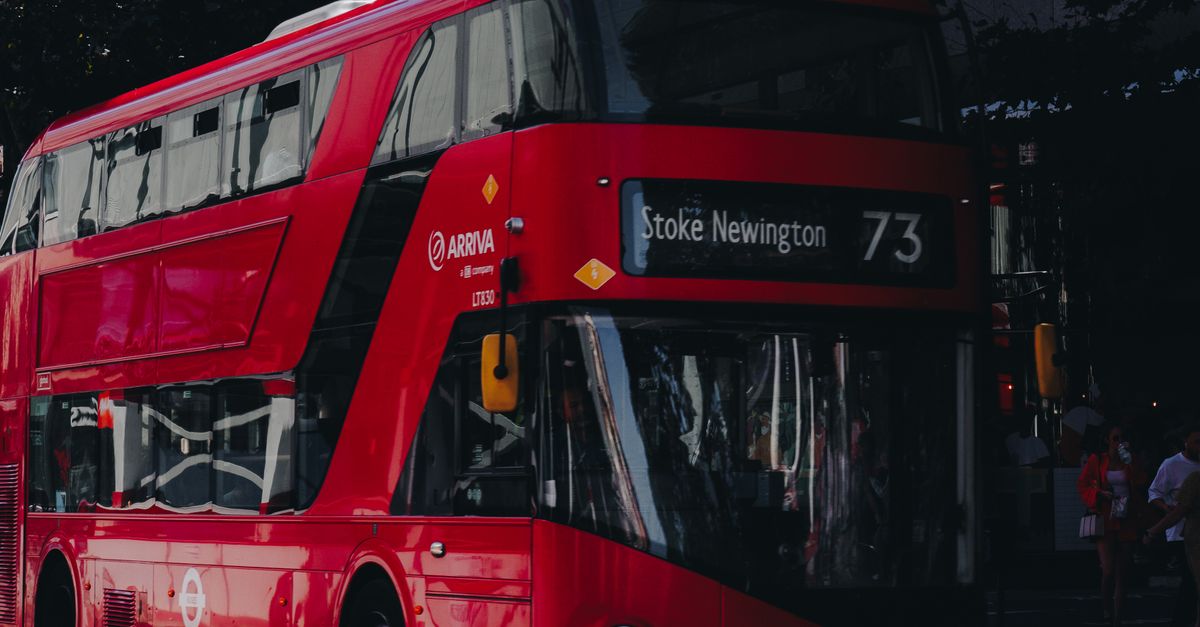 Red Bus Video Red Bus on a Road · Free Stock Photo