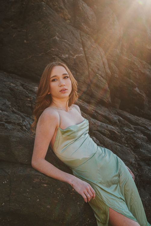 Woman in Satin Gown Lying on Rocks Free Stock Photo Woman in Satin Gown Lying on Rocks Free Stock Photo