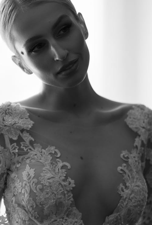 Black and White Photo of a Bride in a Lace Dress 