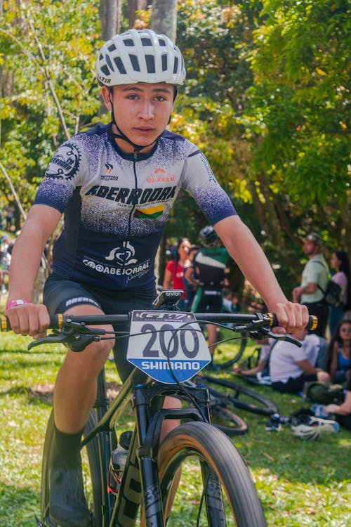 Free Boy on Mountain Bike in Race Stock Photo