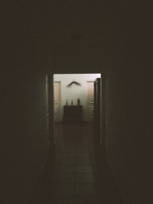 Abstract Photo of a Dark Interior and Illuminated Corridor