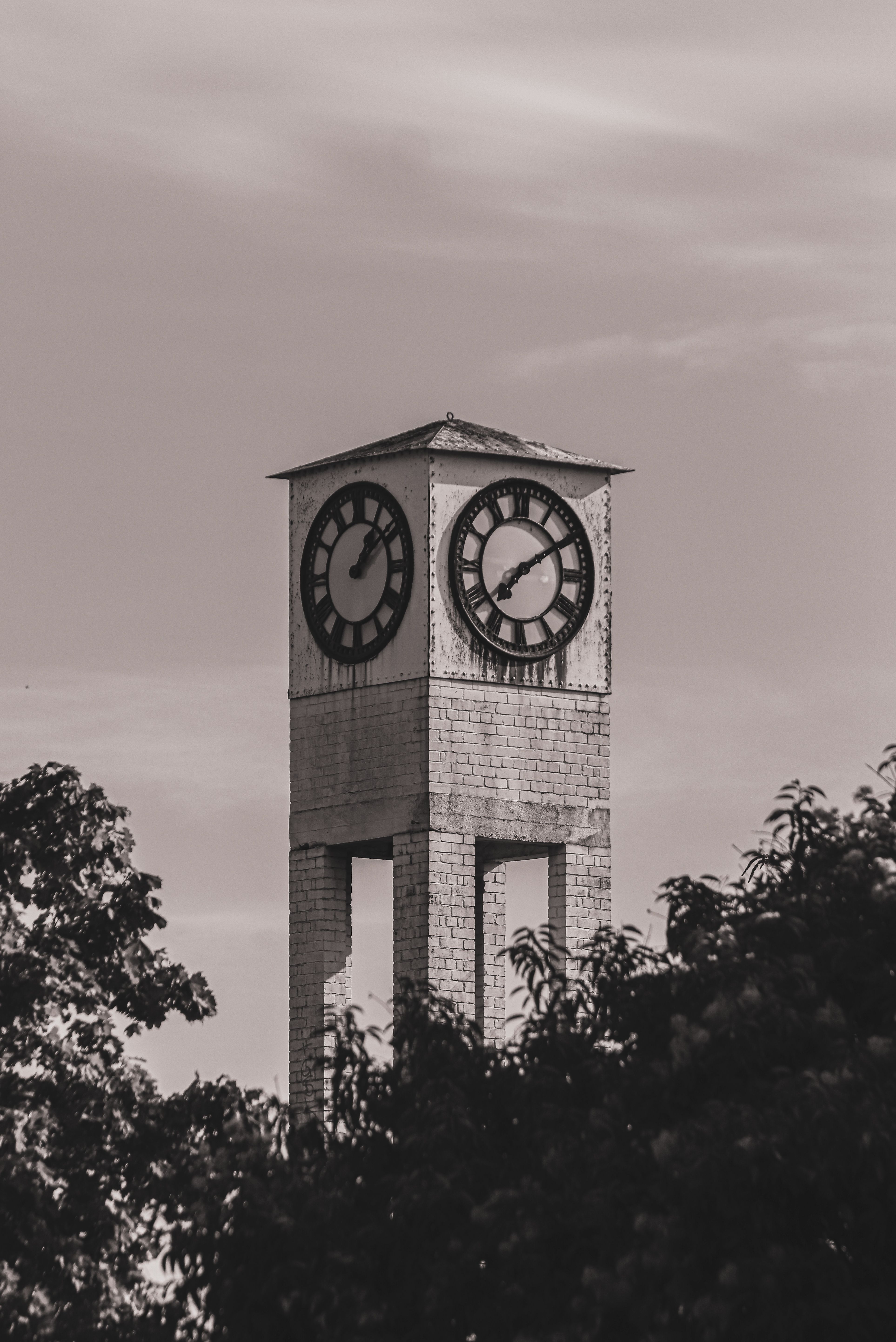 Black and White Photo of Brick Clock Tower against Cloudy Sky · Free ...