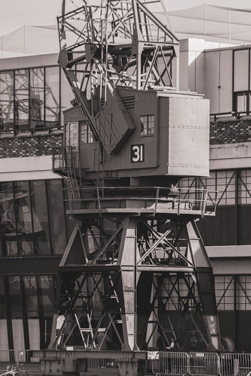 Black and White Photo of Construction Crane Cabin