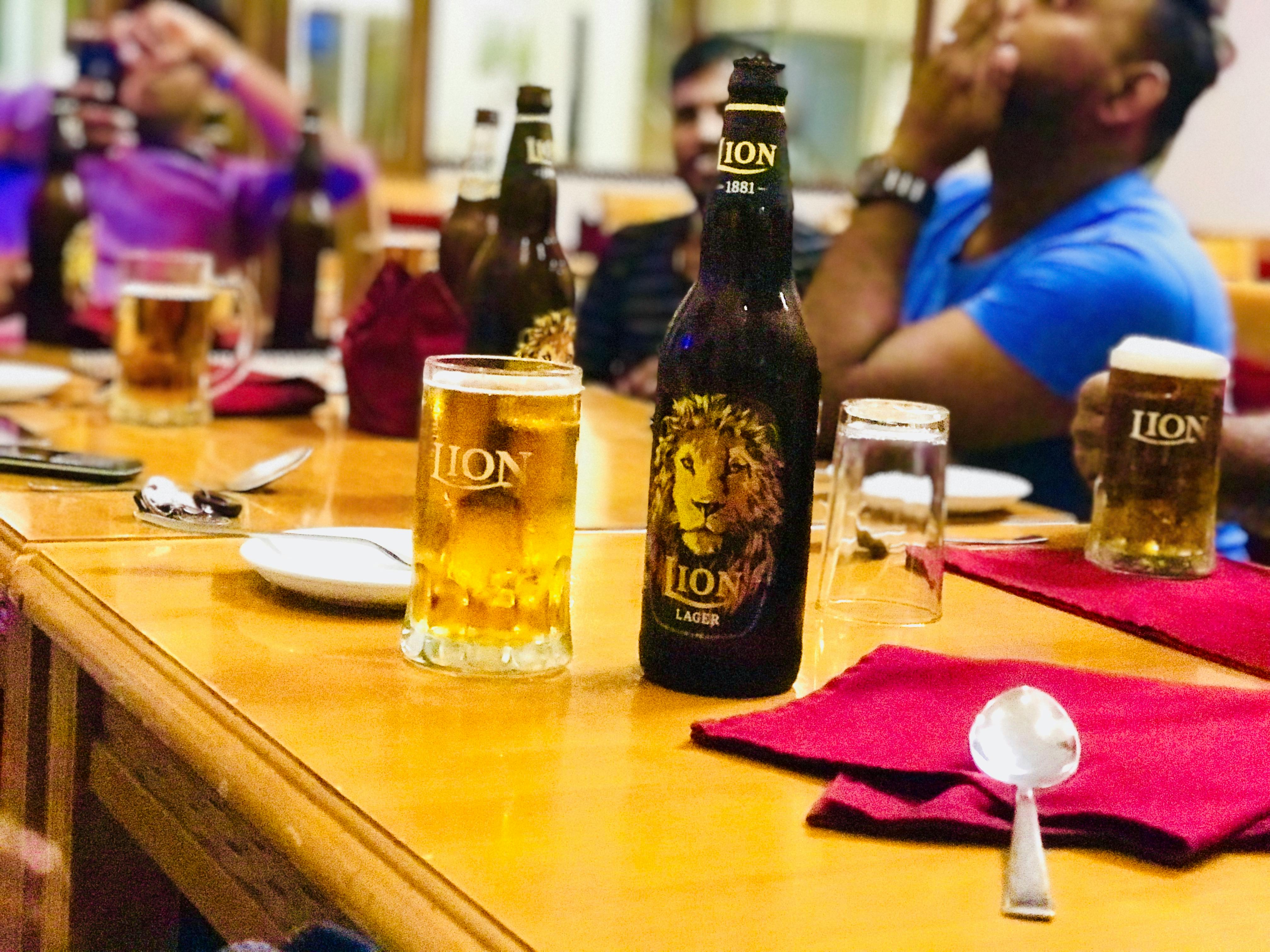 Travelers relaxing inside a comfortable train cabin