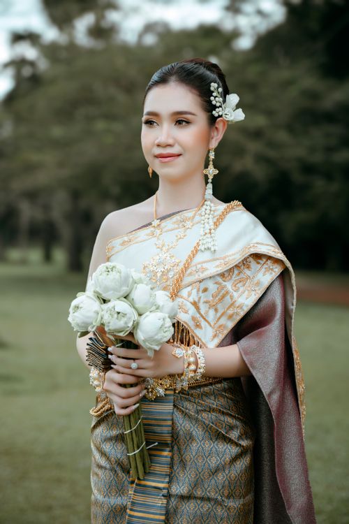 khmer dress for wedding party Feeling so grateful to wear this stunning traditional dress, a true work of art that connects me to my Cambodian heritage. Thank you to @nobdanesamangkar creating something so beautifully Khmer Bridal Wedding Outfits and
