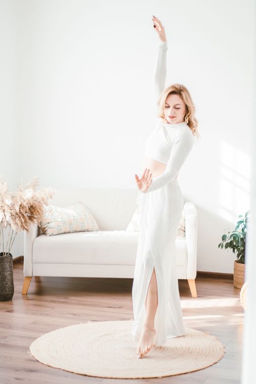 Dancer turning in a sunlit room — photo by Alina Vilchenko on Pexels