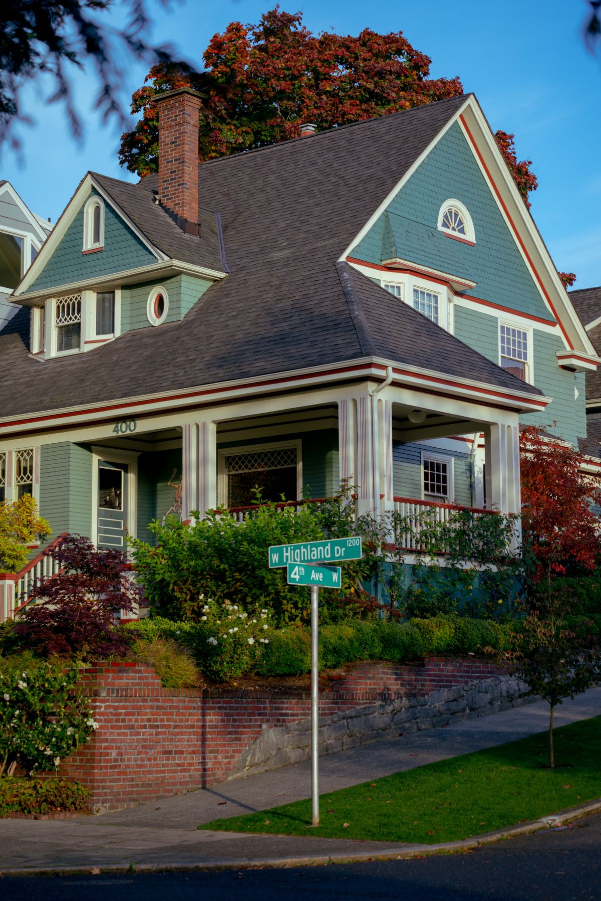 Craftsman-style home on a neighborhood street, the kind of older housing found in Grand Rapids neighborhoods