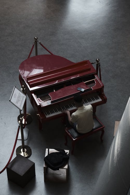 Photo of a Man Playing Piano 