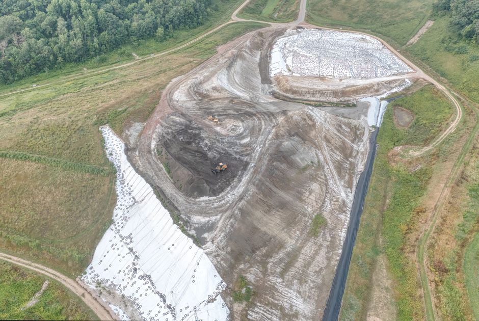 Large-scale Superfund cleanup site showing excavation and soil washing machinery Large-scale Superfund cleanup site showing excavation and soil washing machinery
