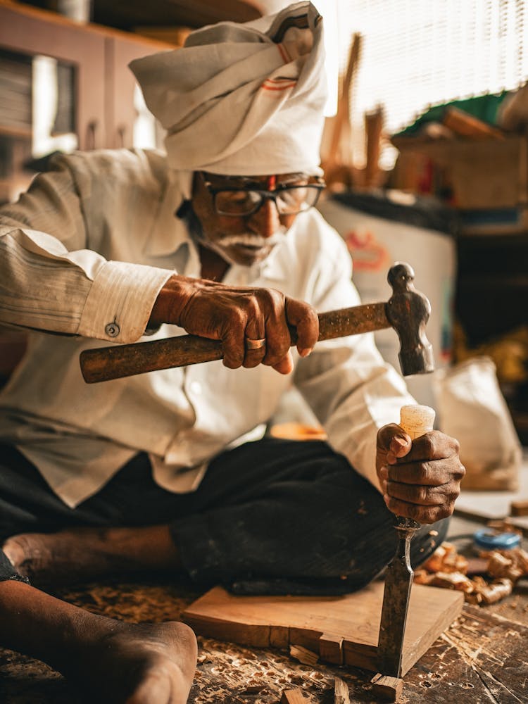 Elderly Man Working With Wood 