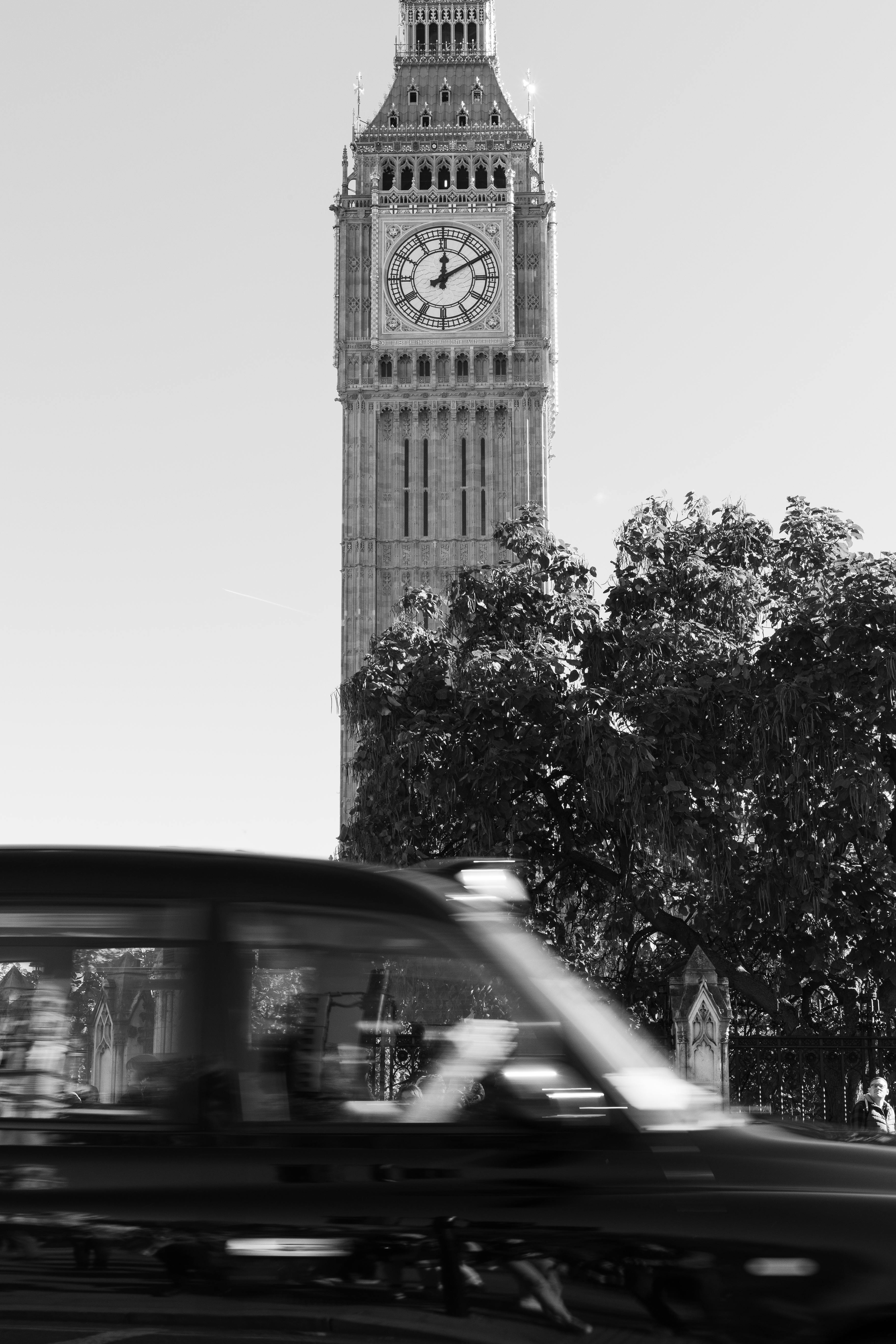 Taxi Passing by Elizabeth Tower Also Known as London Big Ben in 