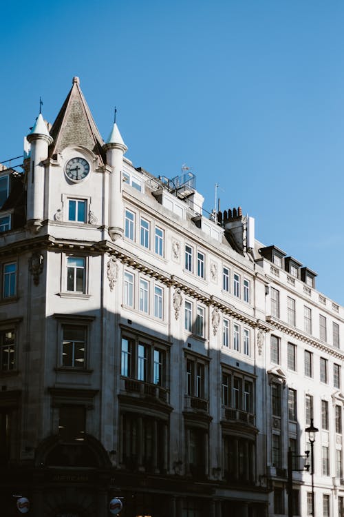 Building of the Americana London Restaurant with a Clock on the Facade