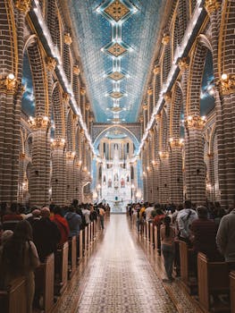 Beautiful view of the interior of a church in Jardin, Colombia, showcasing architectural details and a congregation.