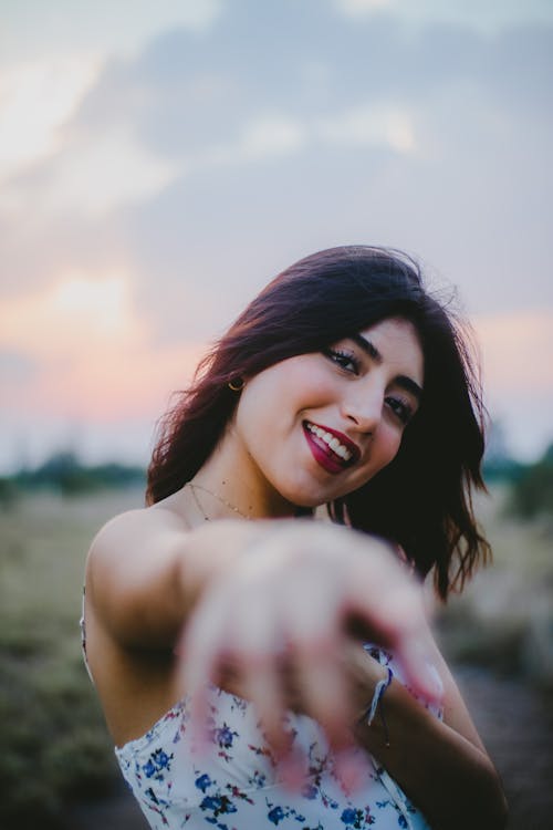 Free Smiling Brunette in the Evening Stock Photo