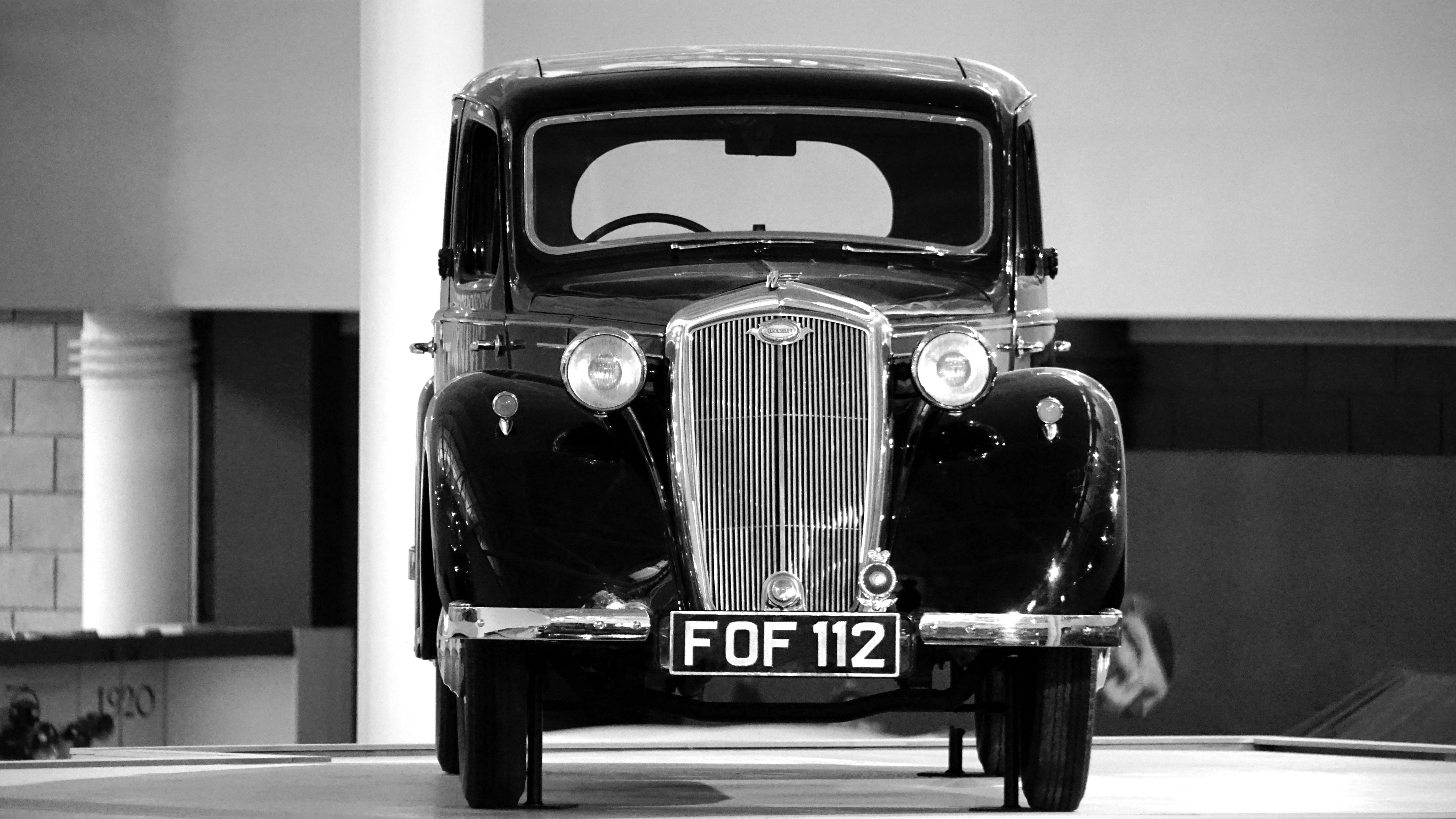 Premium Photo  Beautiful retro car stands on a black background