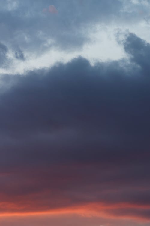 Foto profissional grátis de azul, cor-de-rosa, nuvens