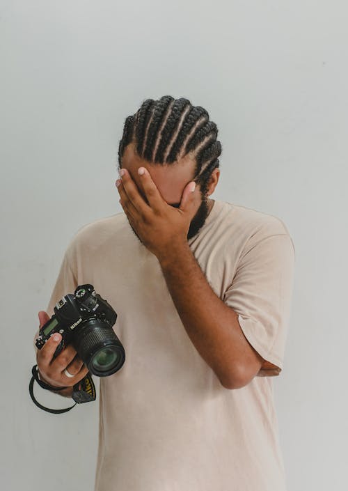 Photographer Showing Facepalm 