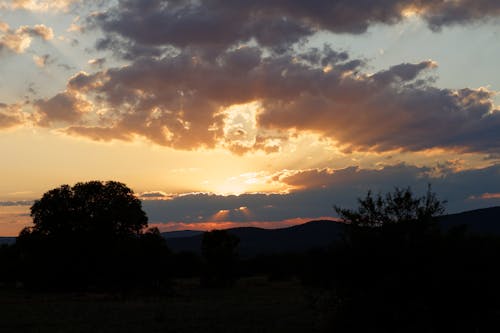 Kostnadsfri bild av gyllene solnedgång, himmel, moln