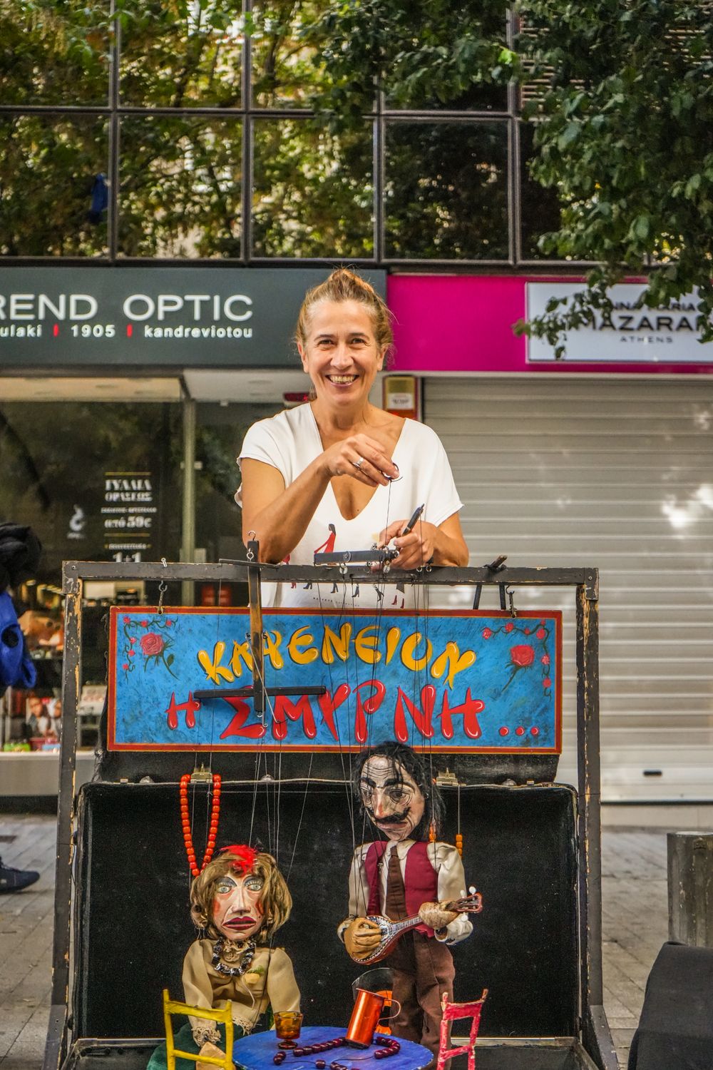 Man Performing with Puppets on a Street · Free Stock Photo