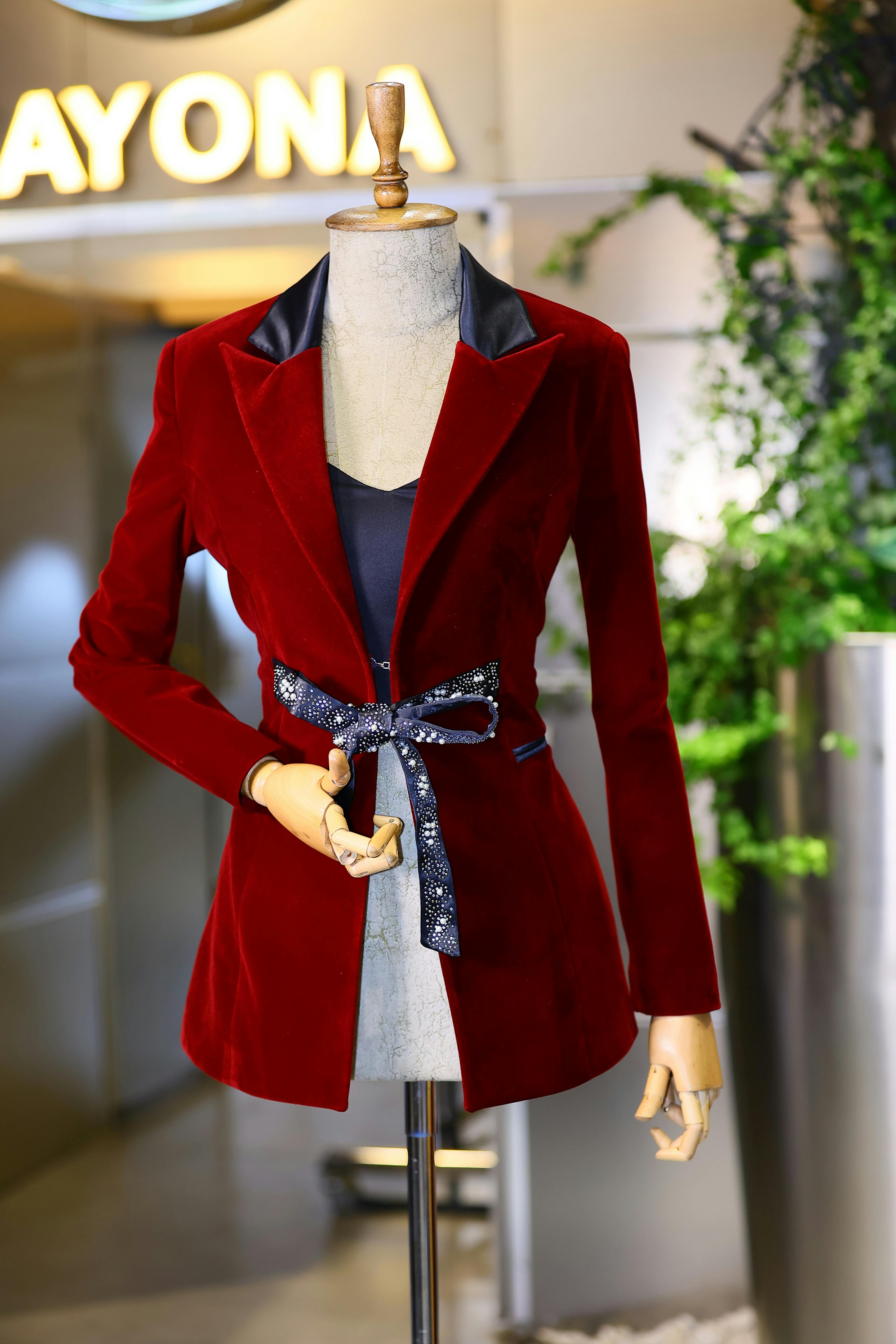 elegant dark red blazer jacket on a mannequin