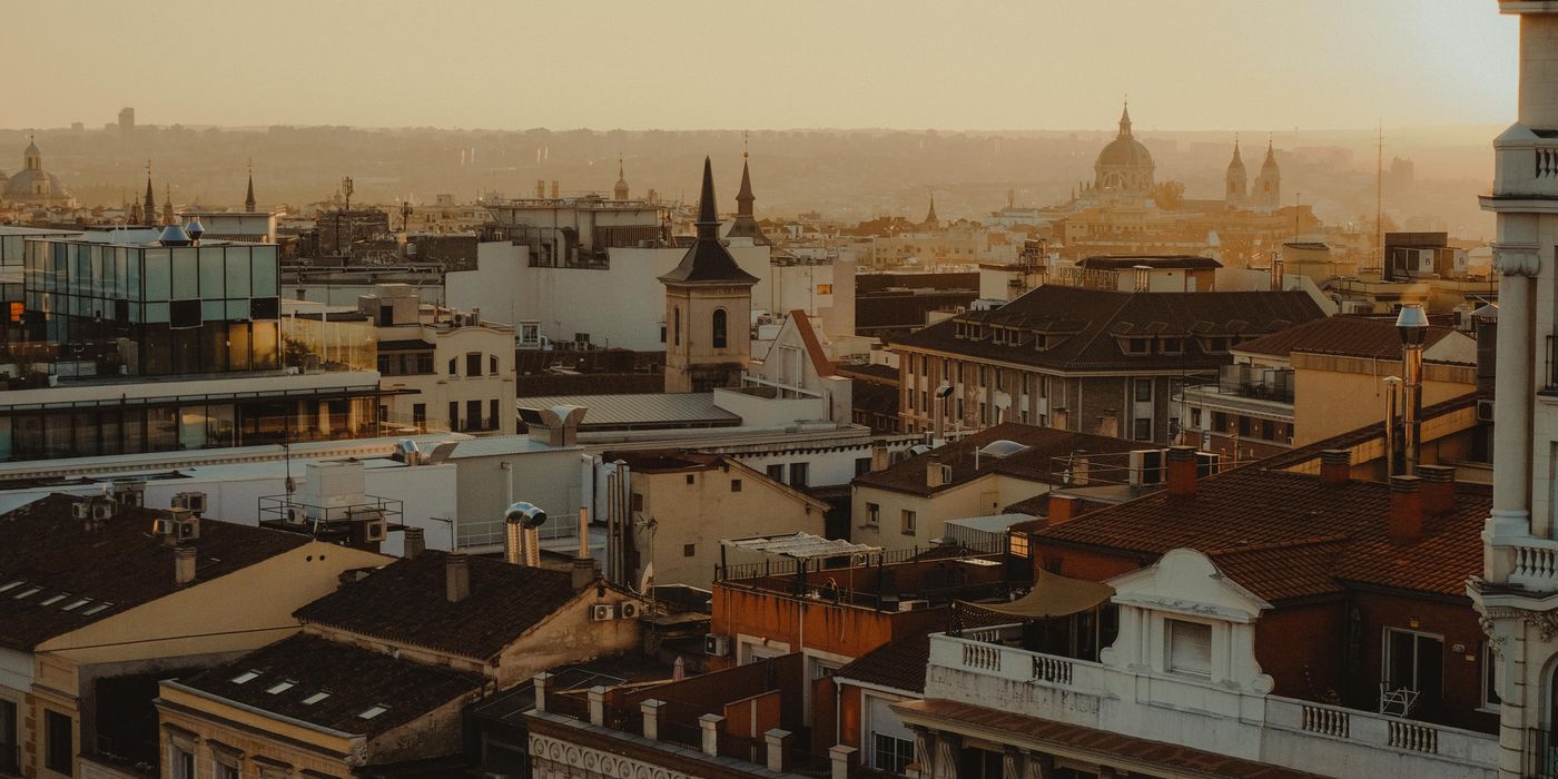 Madrid skyline and rooftops at sunset from above