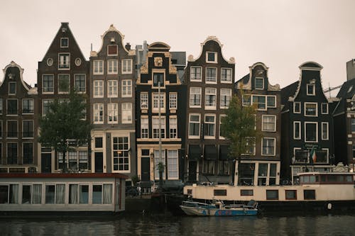 Waterfront Houses by the Canal in Amsterdam, the Netherlands 