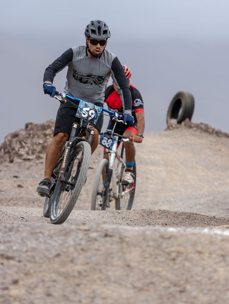 Photo Of Men Mountain Bike Racing 