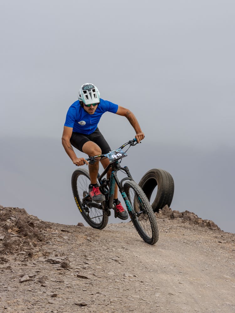 Photo Of A Man Mountain Bike Racing 