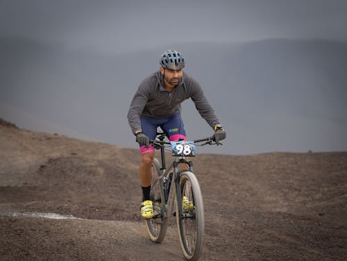 Photo of a Man Mountain Bike Racing 