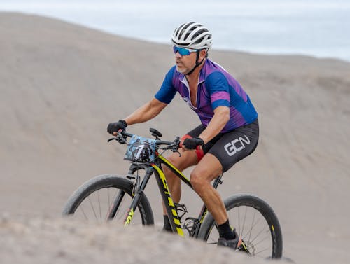 Photo of a Man Mountain Bike Racing 