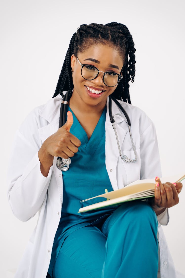 Smiling Doctor Showing Thumb Up