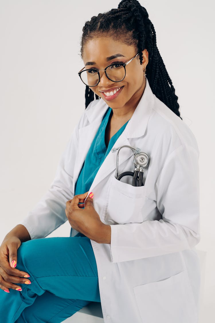 Smiling Doctor With Stethoscope In Pocket