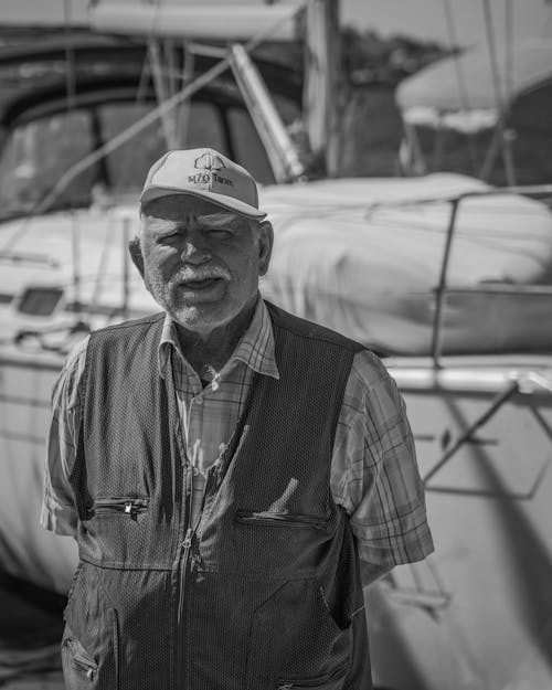 Elderly Man in Cap and Shirt