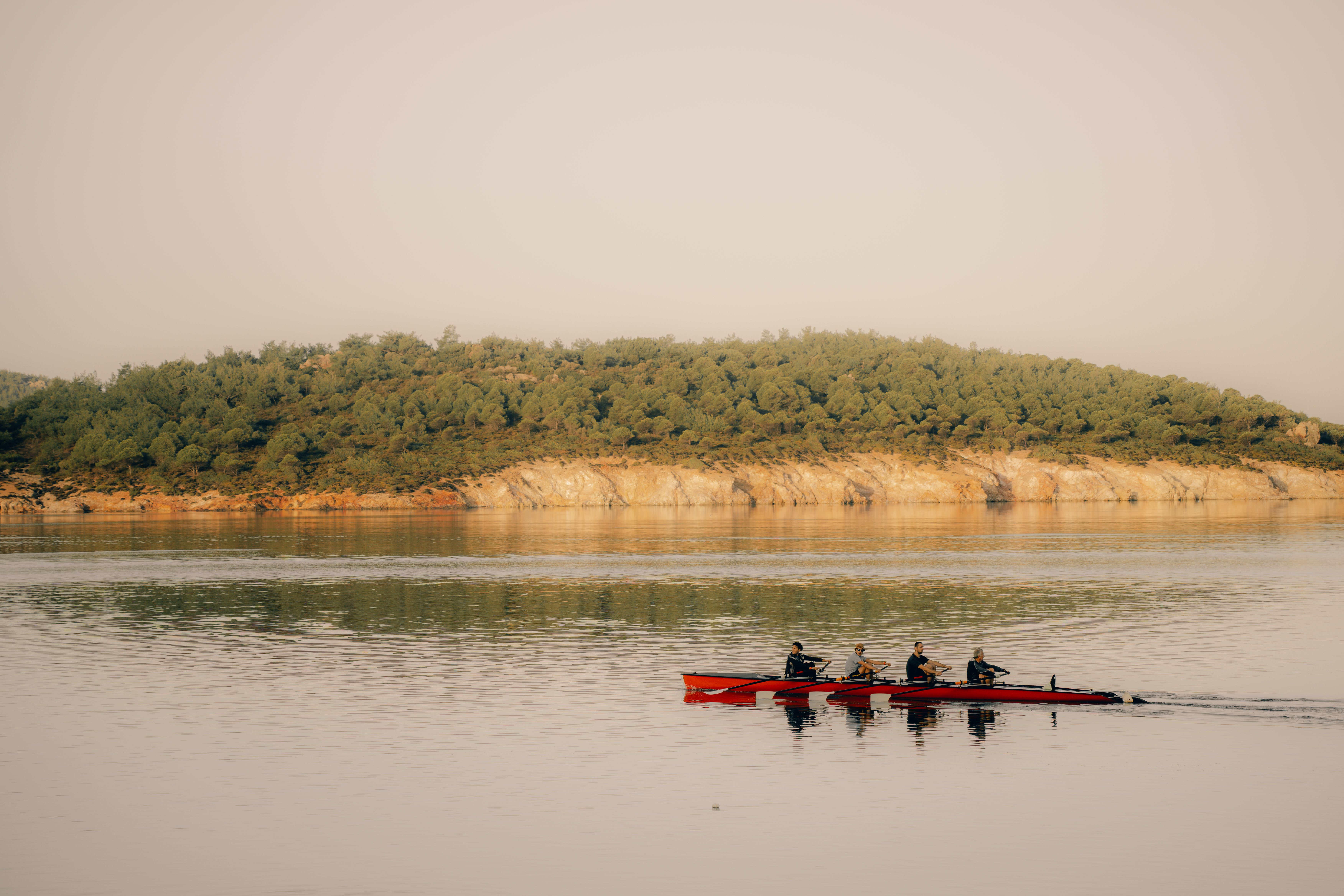 Kayakers Paddling Along the Coast · Free Stock Photo