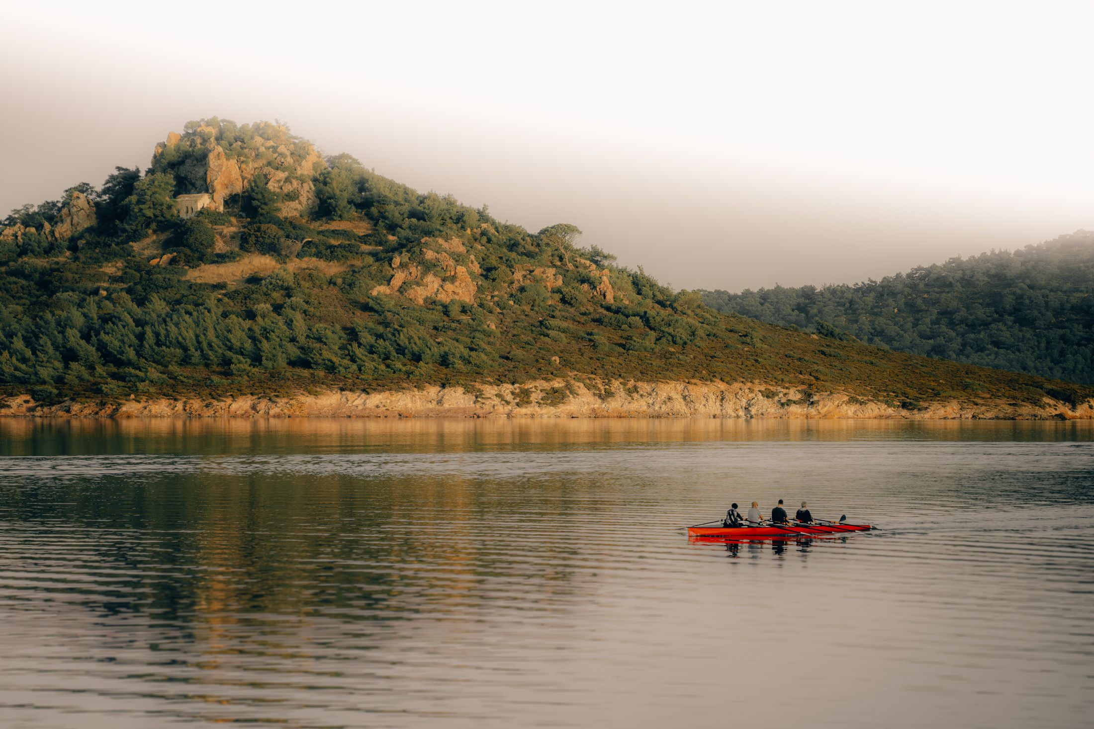 Group of paddlers using recreational kayaks on a lake