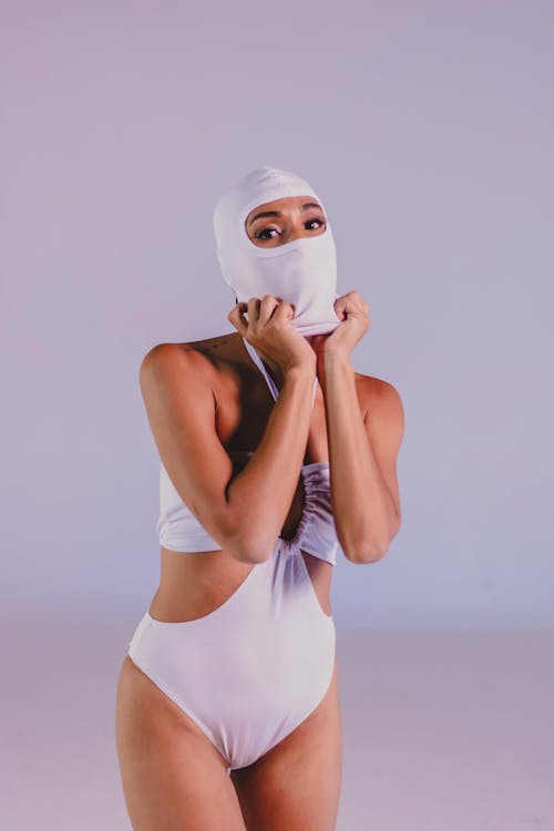 Woman Posing in Bikini and Balaclavas 